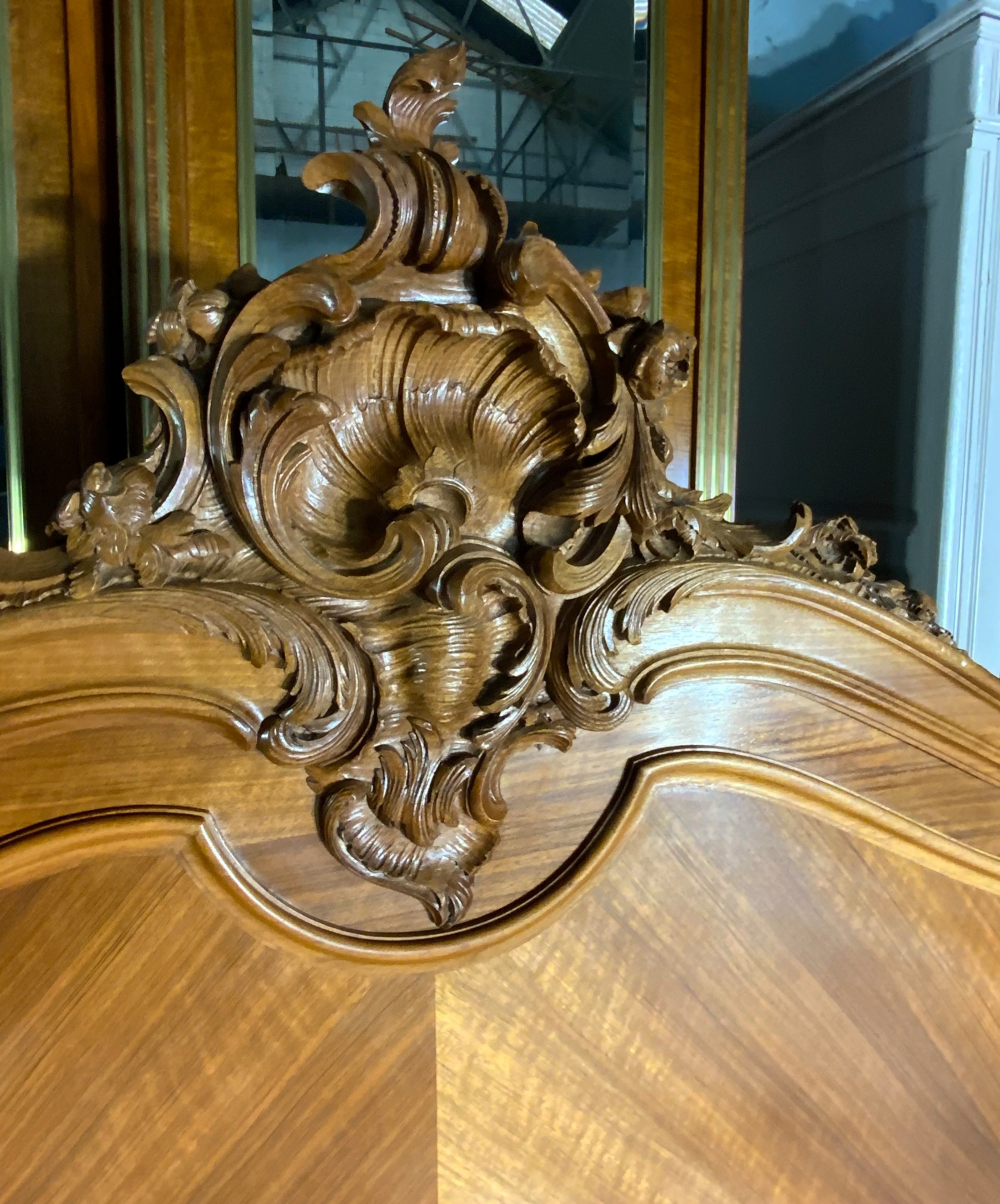 A king size French Louis XV style wooden bed frame featuring a carved crest, parquetry panelwork, and curved legs. View IV