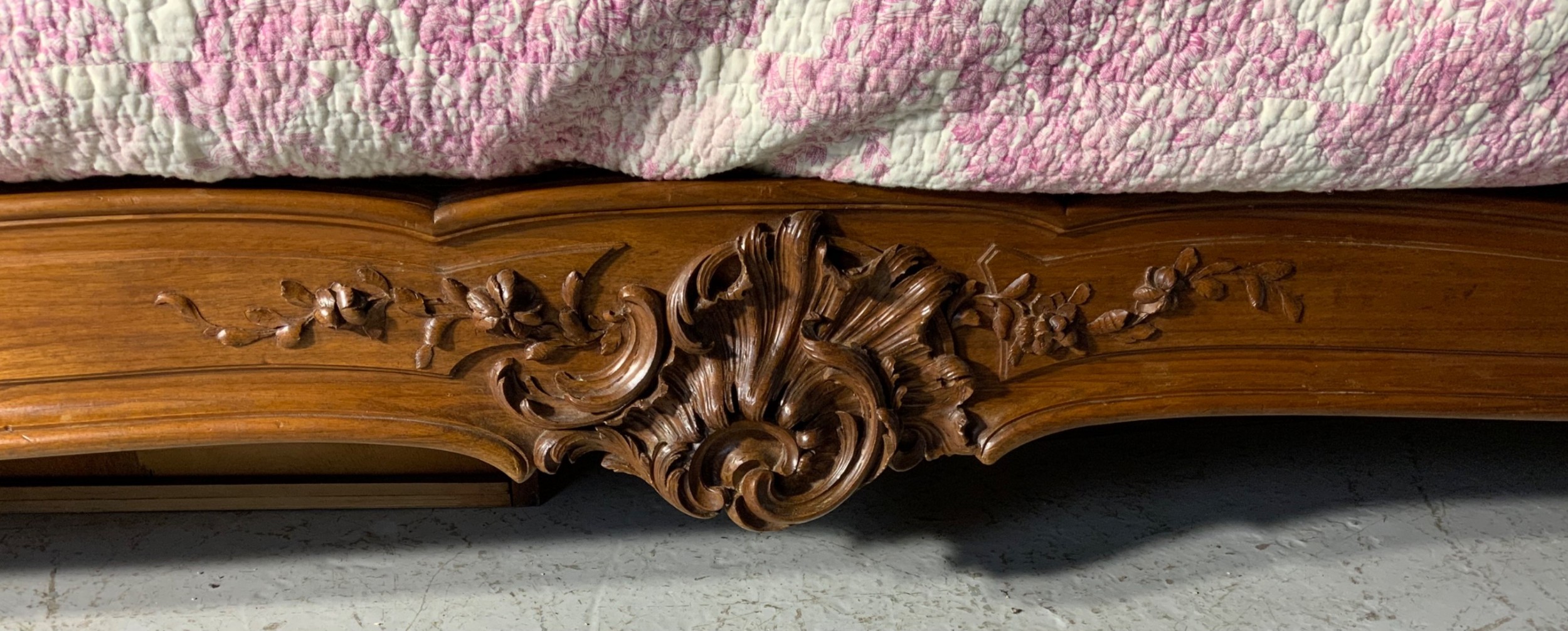 A king size French Louis XV style wooden bed frame featuring a carved crest, parquetry panelwork, and curved legs. View VIII