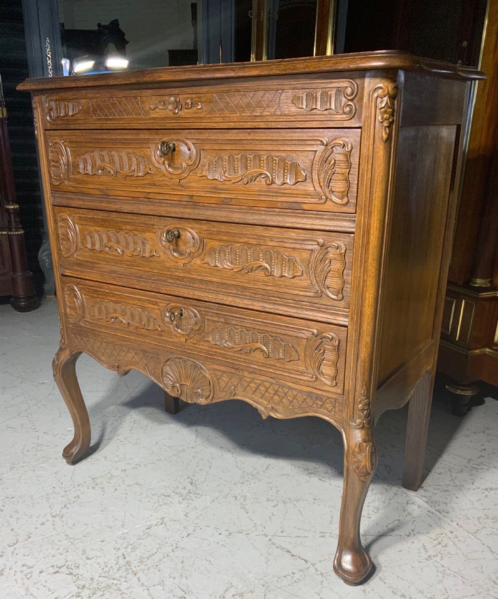 CARVED OAK FRENCH CHEST OF DRAWERS  View III