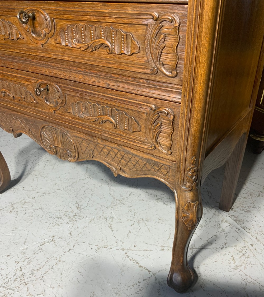 CARVED OAK FRENCH CHEST OF DRAWERS  View V