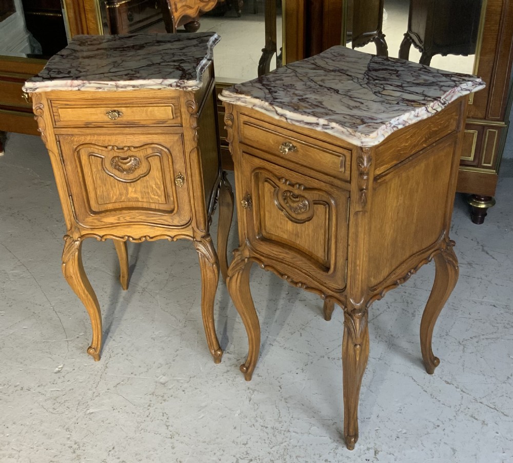 CARVED OAK PAIR OF FRENCH BEDSIDE CABINETS  View II