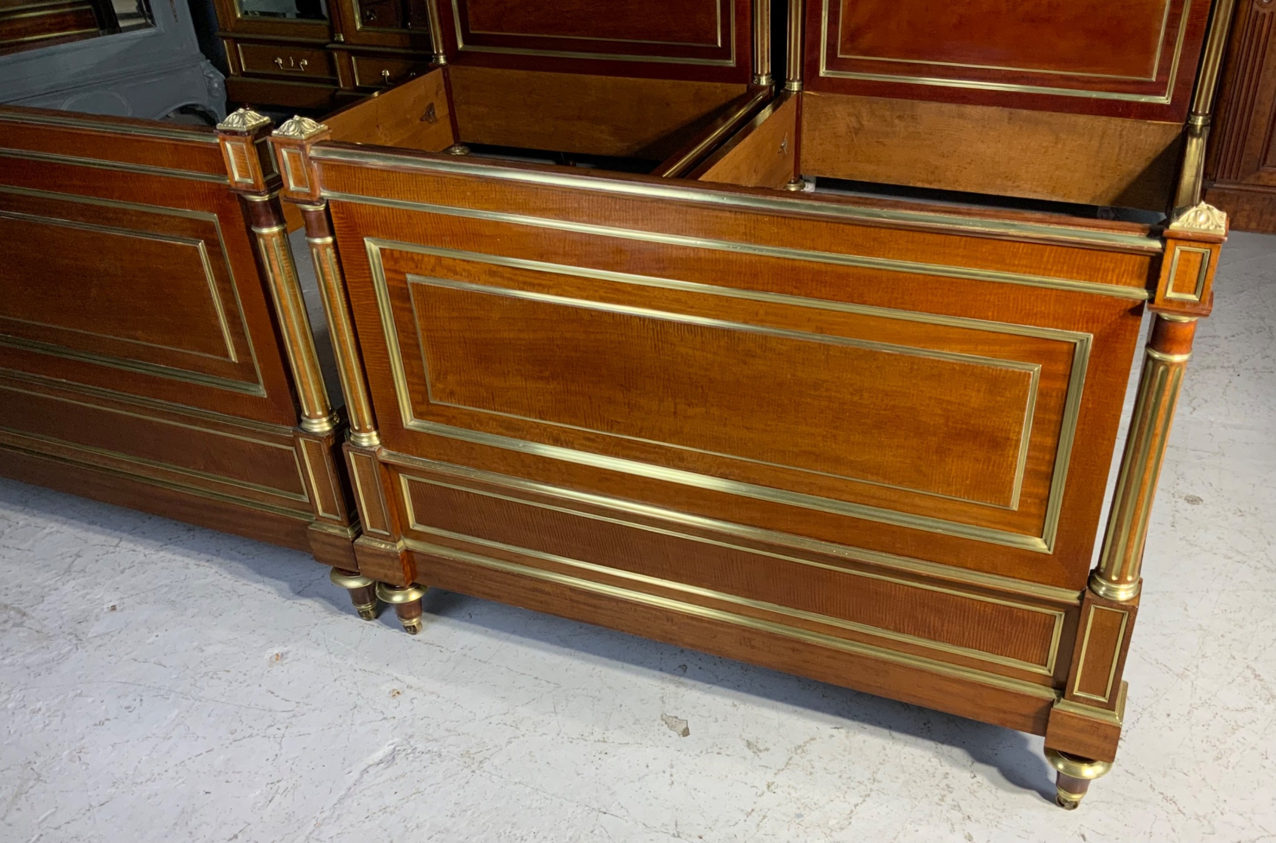 PAIR OF FRENCH MAHOGANY AND BRASS EMPIRE BEDS View III