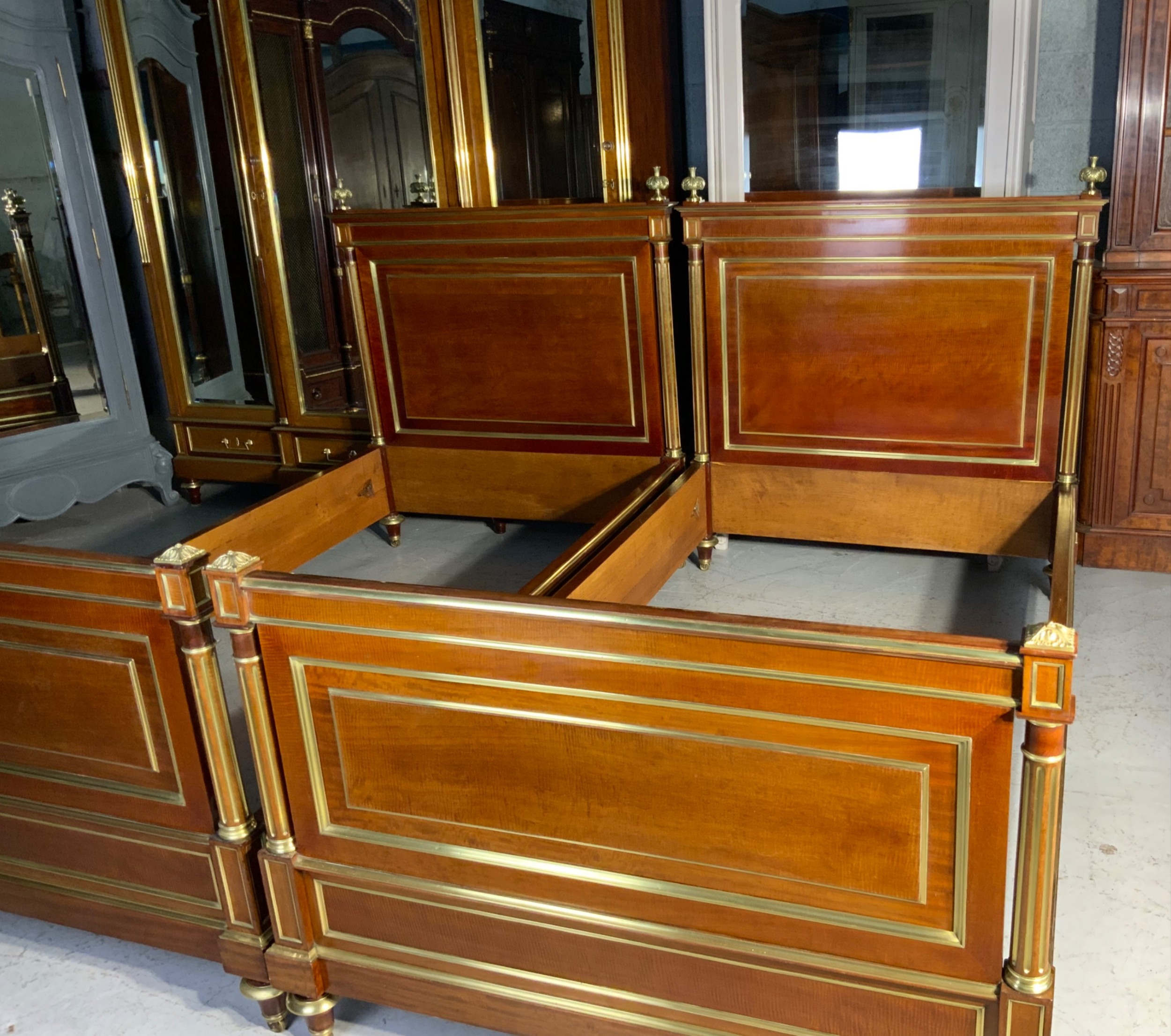 PAIR OF FRENCH MAHOGANY AND BRASS EMPIRE BEDS View IV