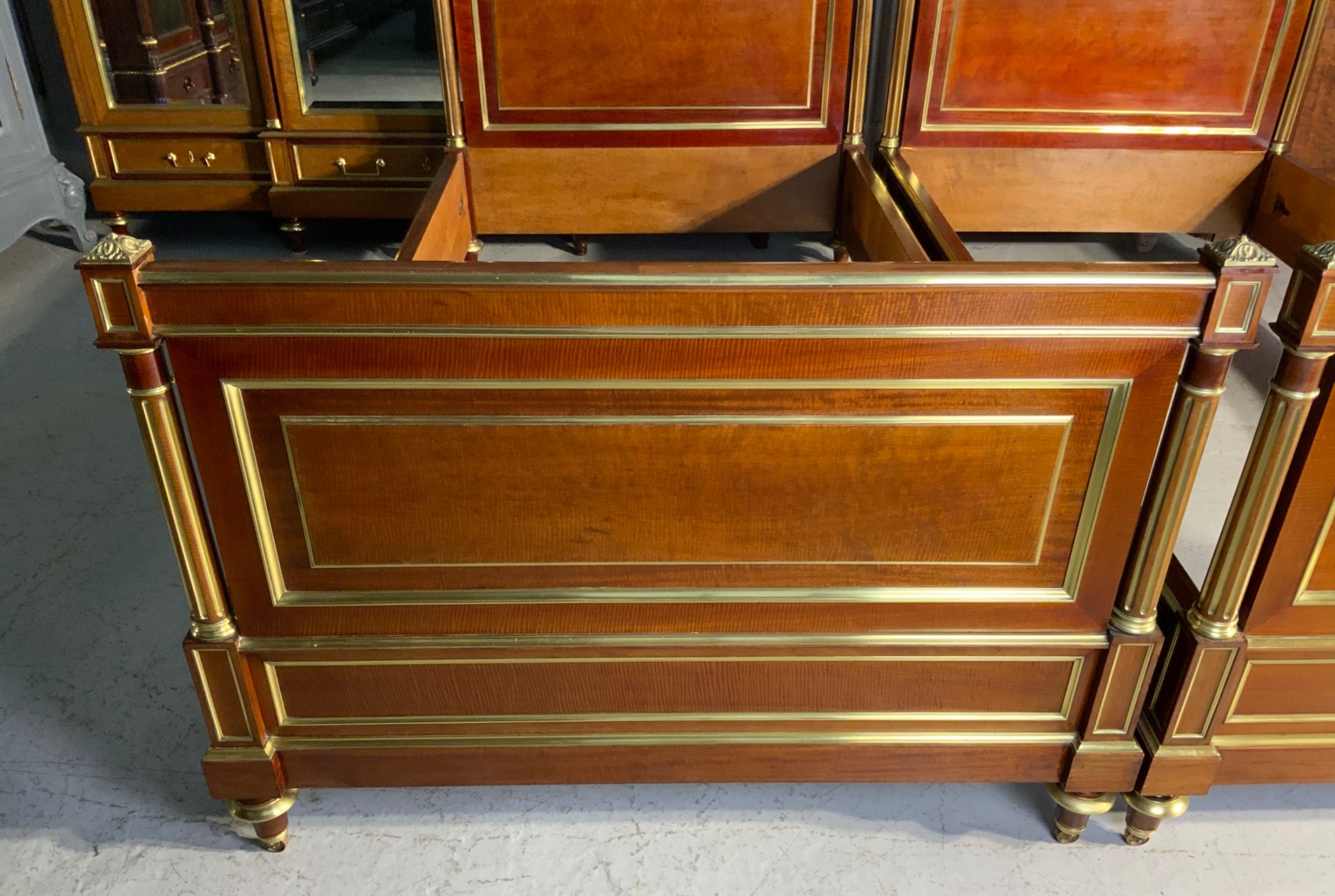 PAIR OF FRENCH MAHOGANY AND BRASS EMPIRE BEDS View V