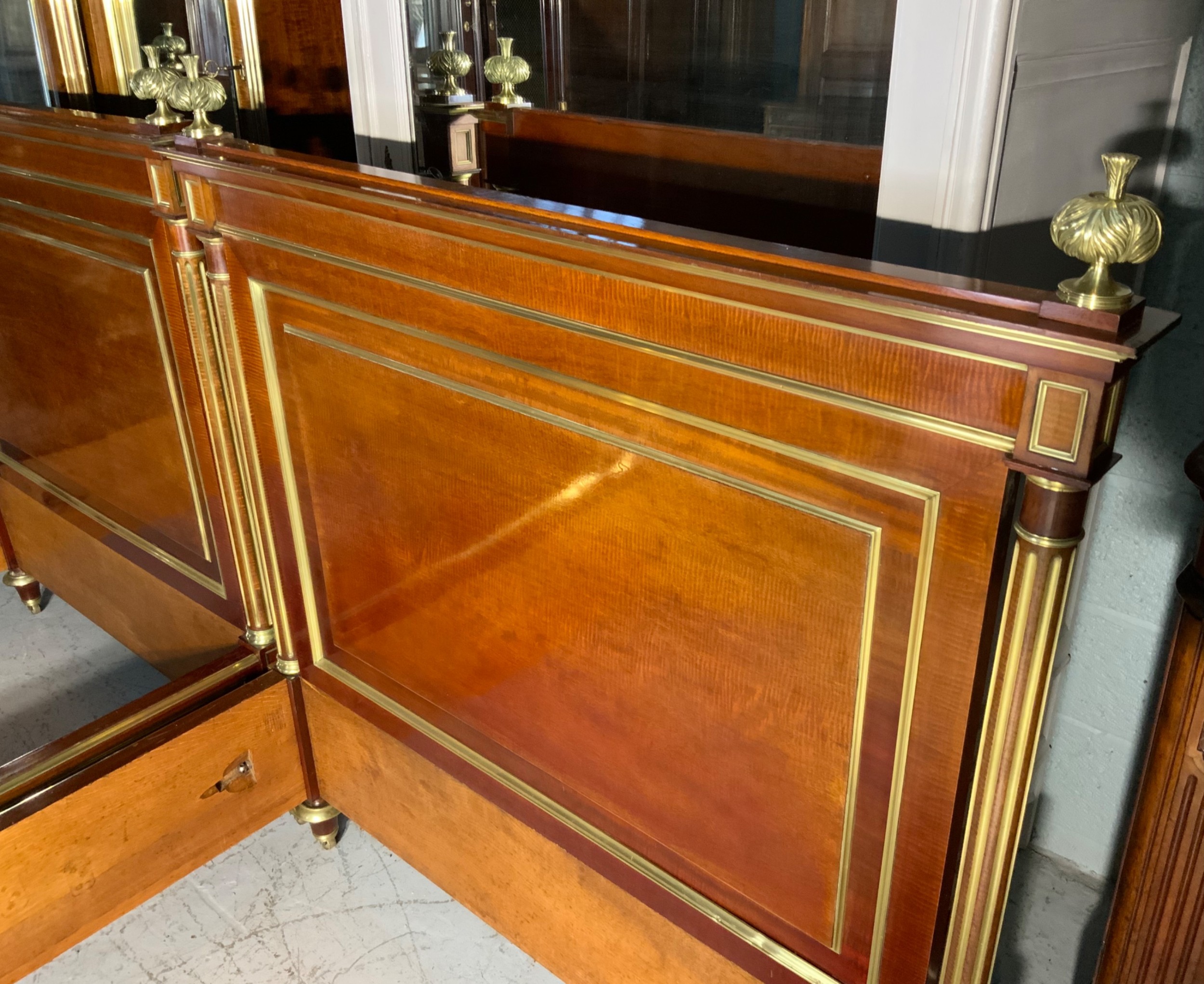PAIR OF FRENCH MAHOGANY AND BRASS EMPIRE BEDS View VI