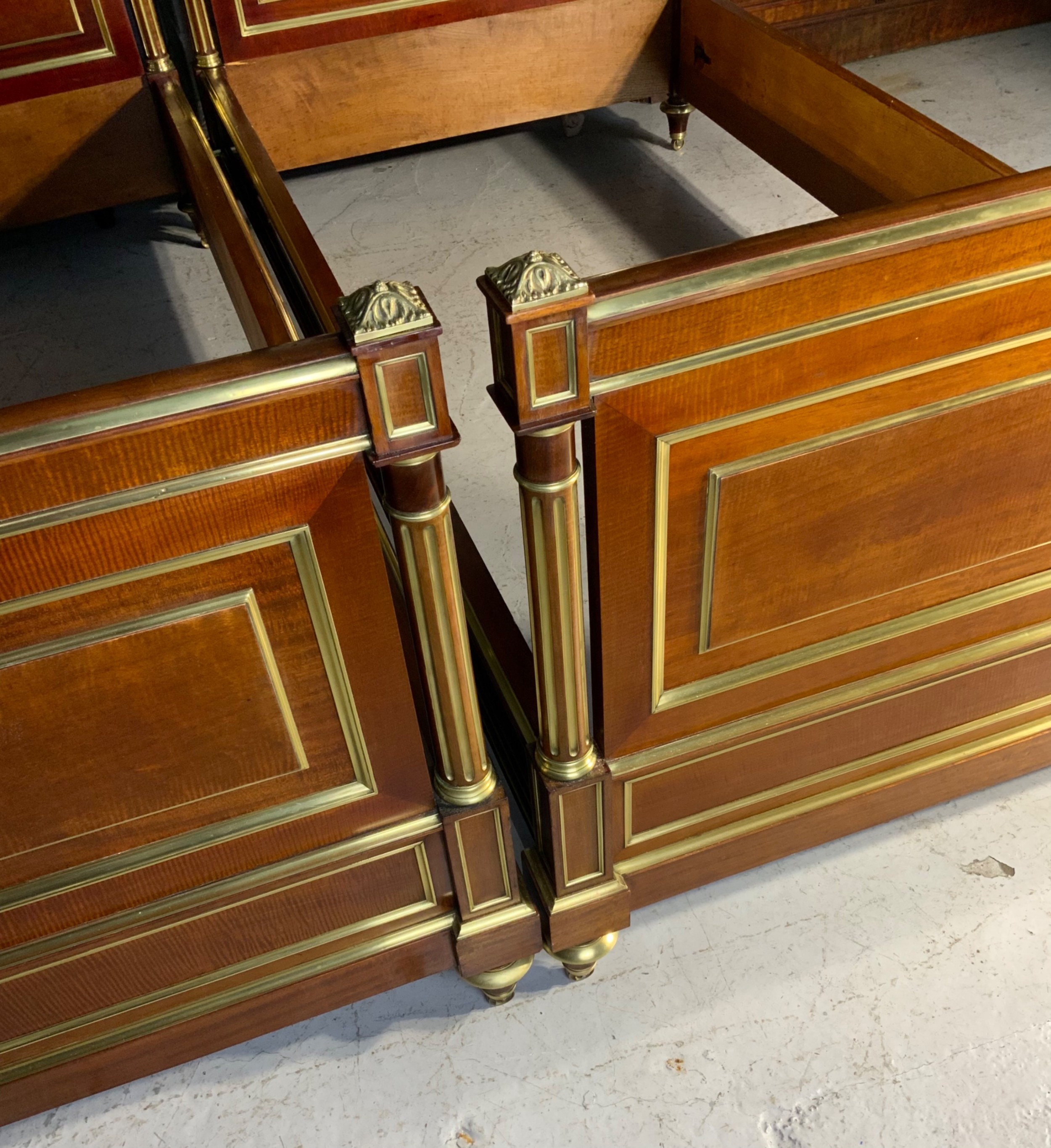 PAIR OF FRENCH MAHOGANY AND BRASS EMPIRE BEDS View VII