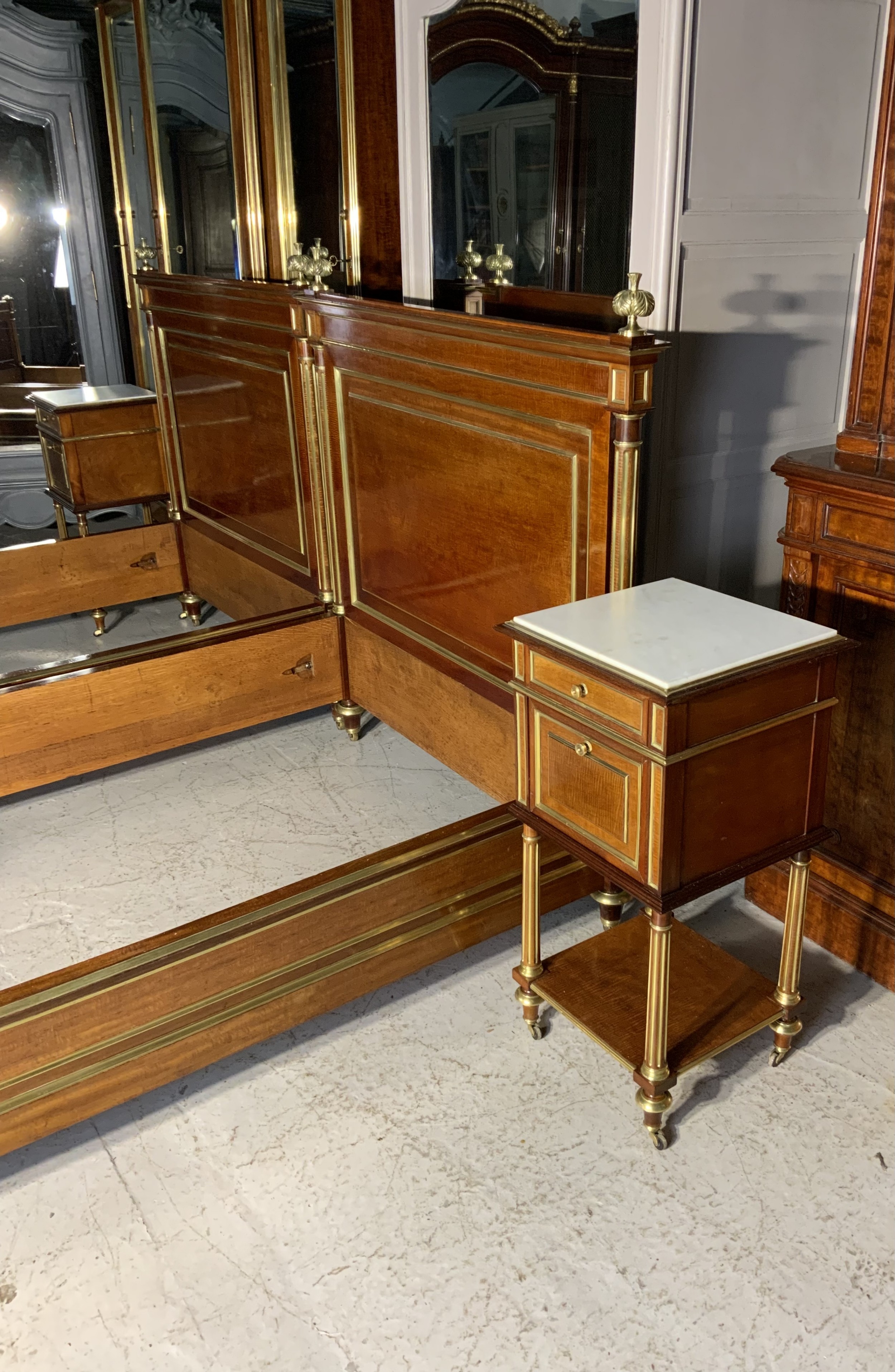 PAIR OF FRENCH MAHOGANY AND BRASS EMPIRE BEDS View IX