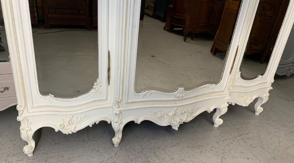 STUNNING OVERSIZED CARVED TRIPLE ARMOIRE  View VI