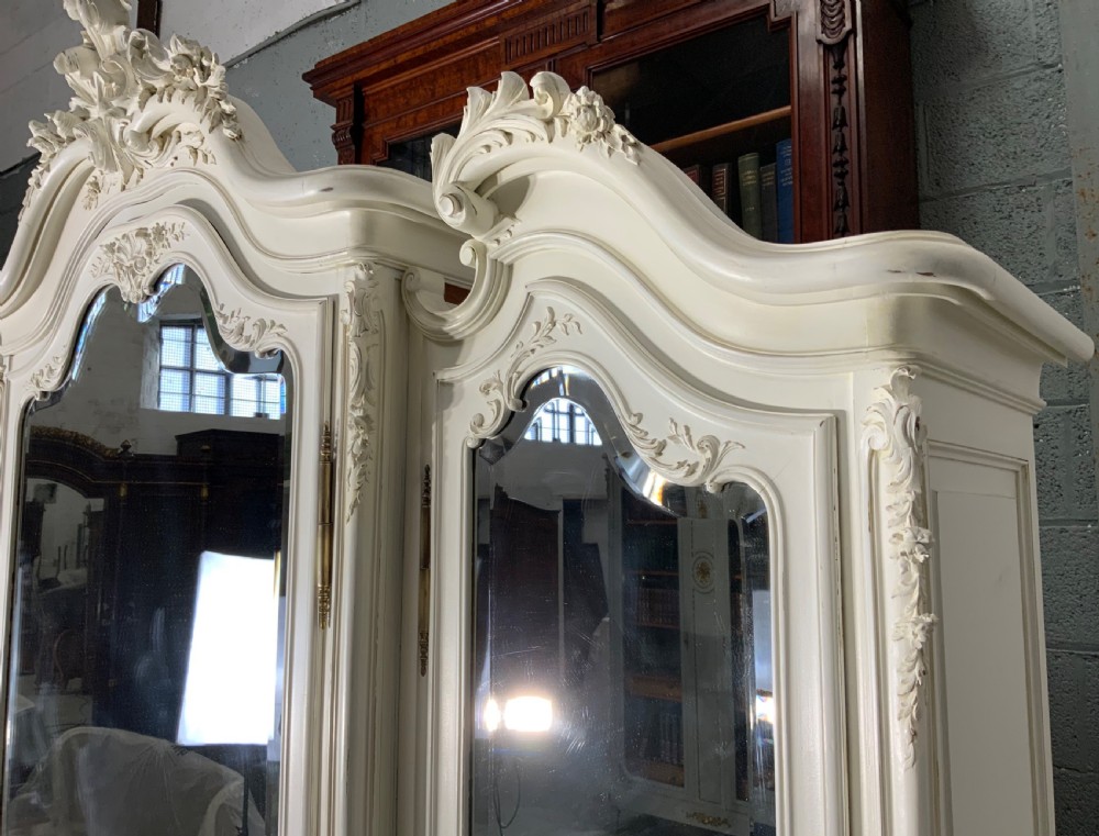 STUNNING OVERSIZED CARVED TRIPLE ARMOIRE  View VIII