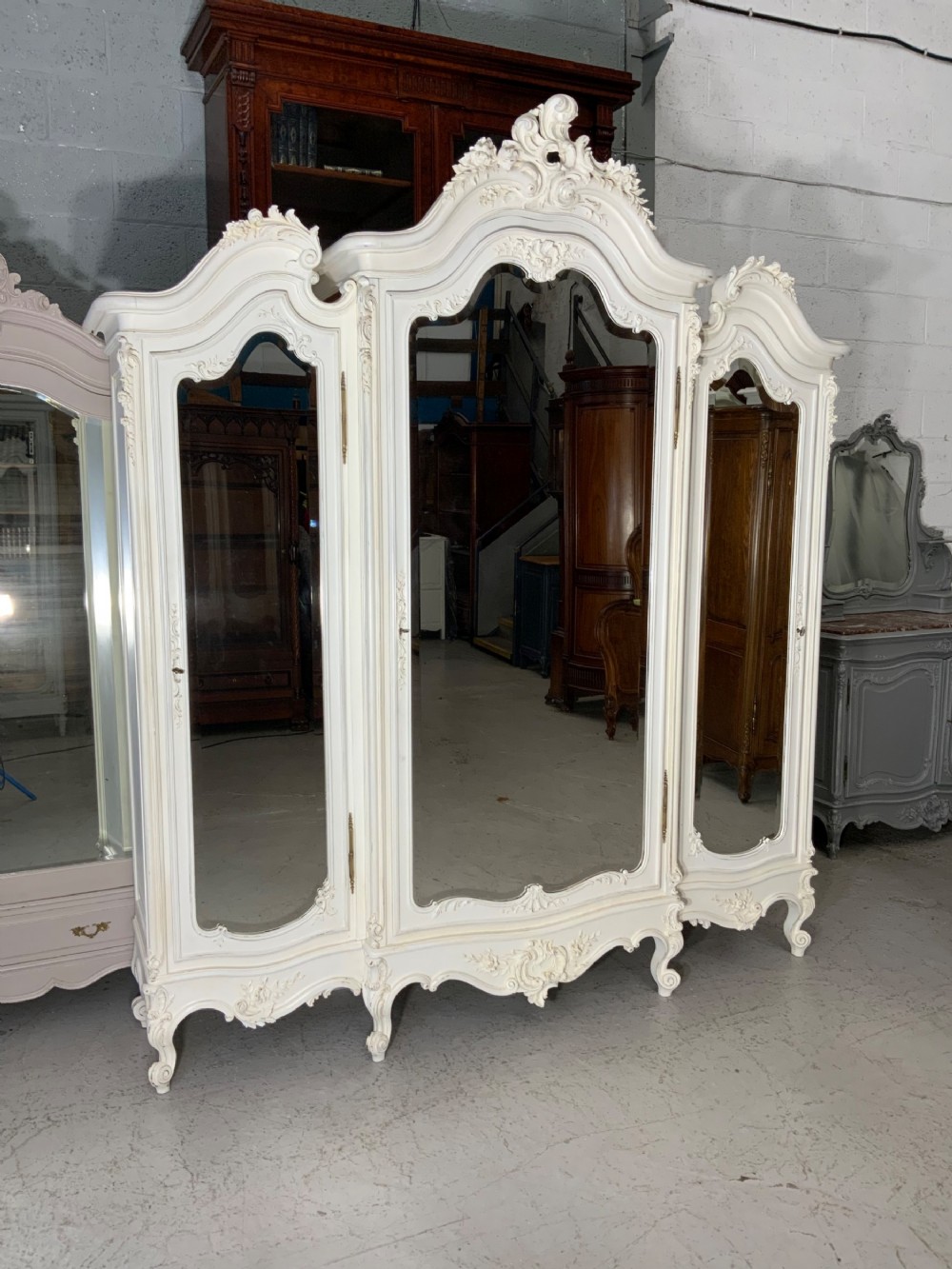 STUNNING OVERSIZED CARVED TRIPLE ARMOIRE  View XVII