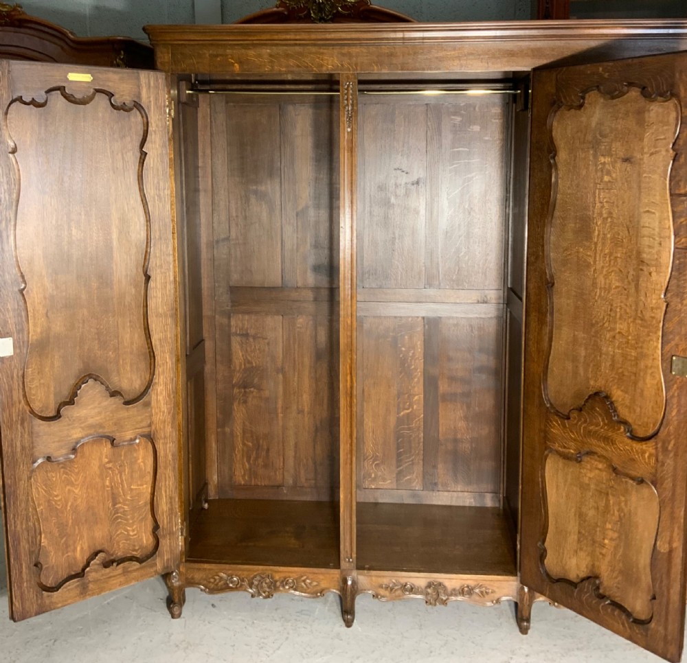 CARVED OAK TRIPLE ARMOIRE  View III
