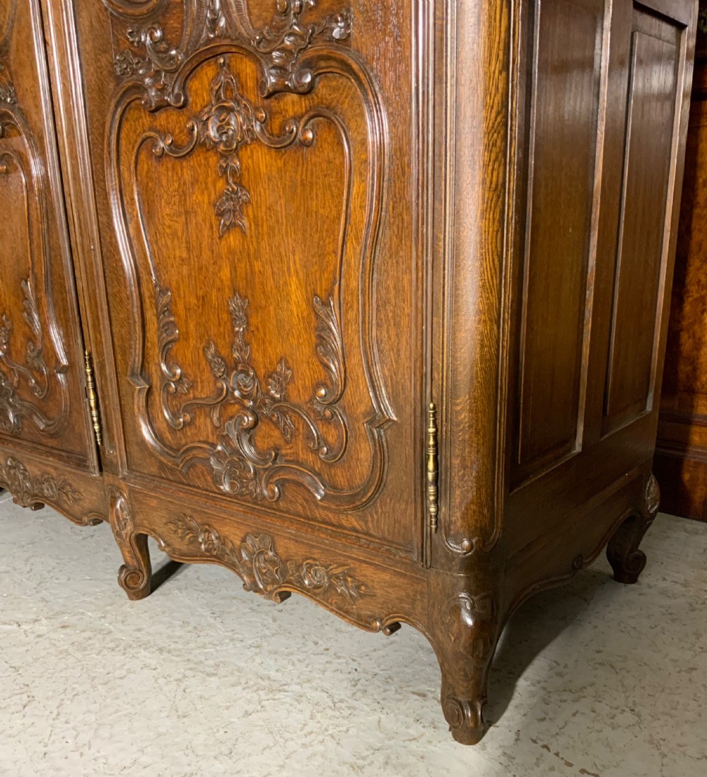 CARVED OAK TRIPLE ARMOIRE  View VI