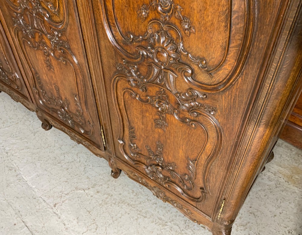 CARVED OAK TRIPLE ARMOIRE  View VII