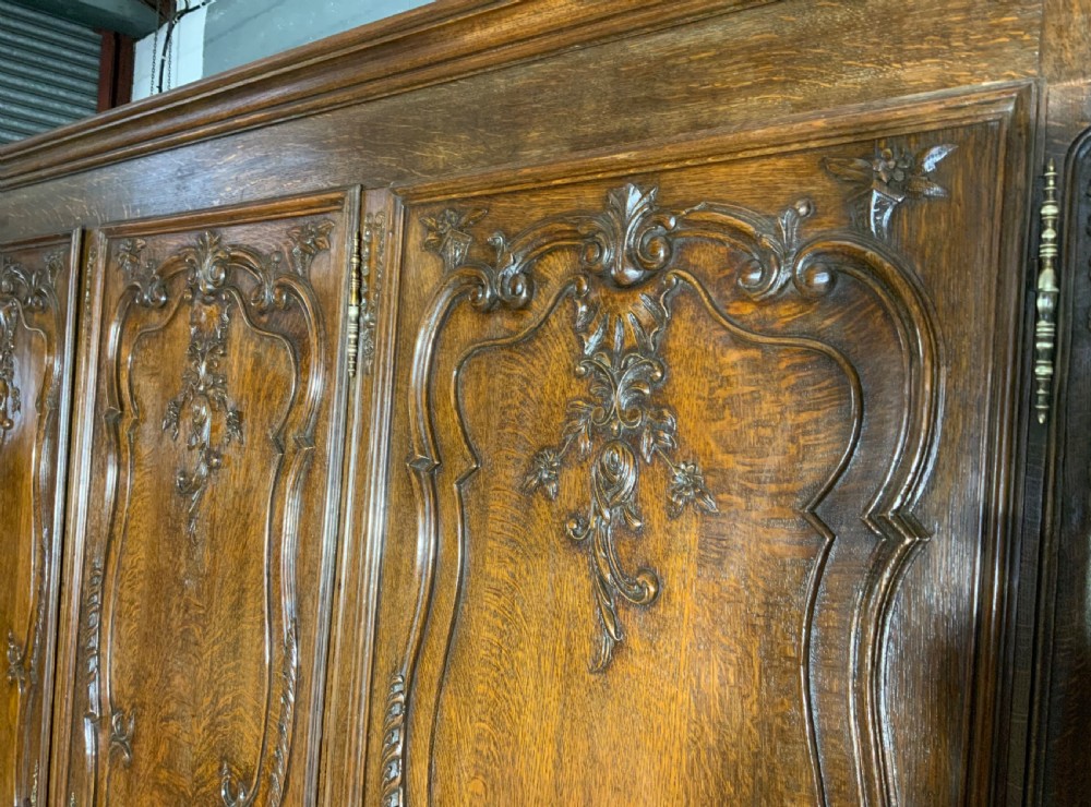 CARVED OAK TRIPLE ARMOIRE  View IX