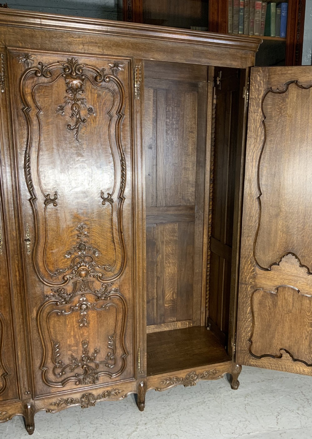 CARVED OAK TRIPLE ARMOIRE  View X