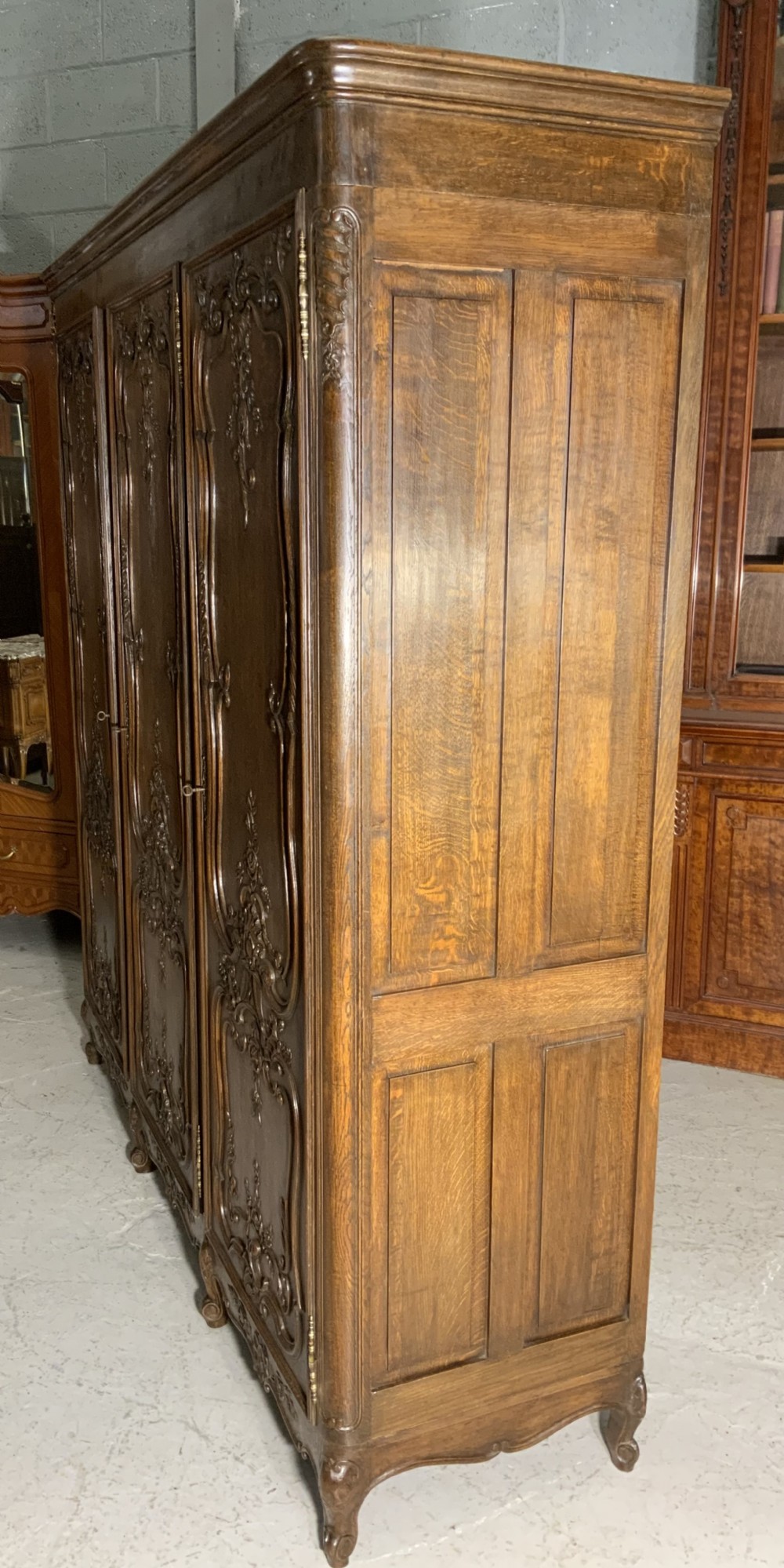 CARVED OAK TRIPLE ARMOIRE  View XI
