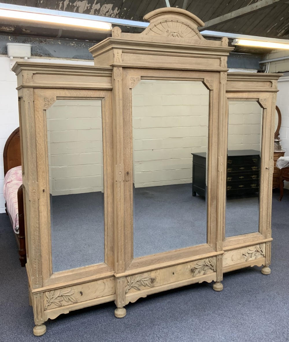 LARGE FRENCH TRIPLE BLEACHED OAK ARMOIRE 