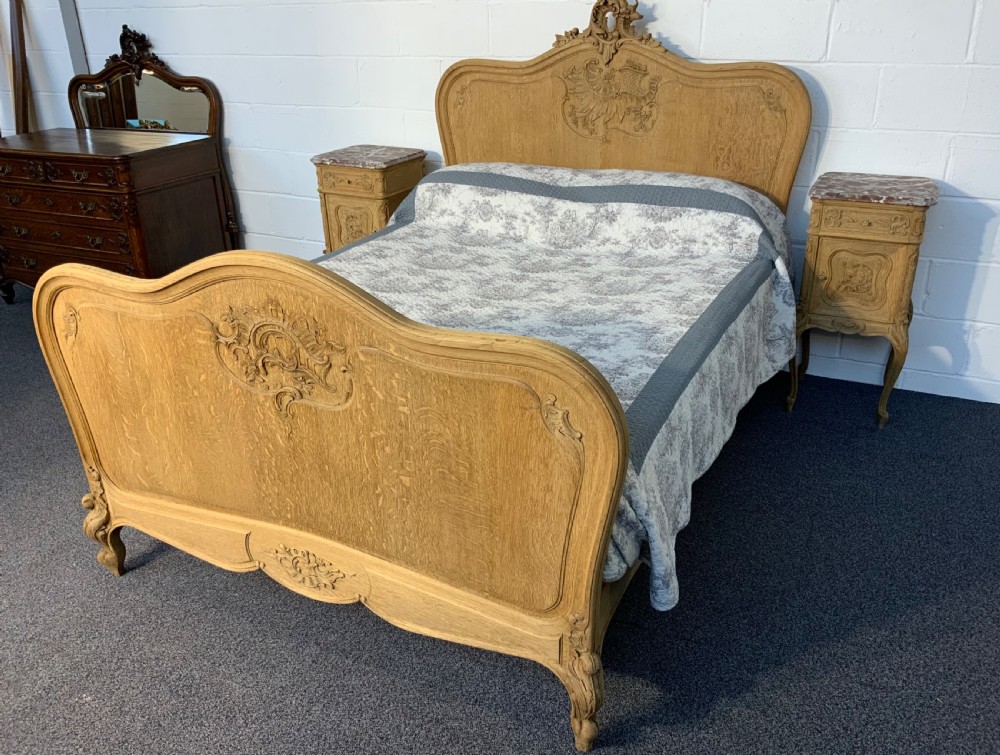 KINGSIZE FRENCH BLEACHED OAK BED AND MATCHING BEDSIDE CABINETS  View II