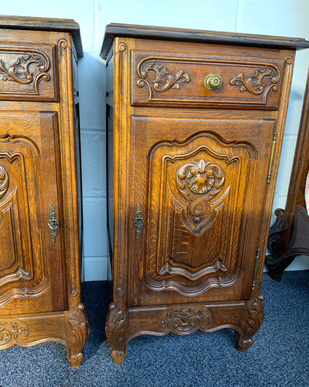 PAIR OF OAK CARVED BEDSIDE CABINETS  View V