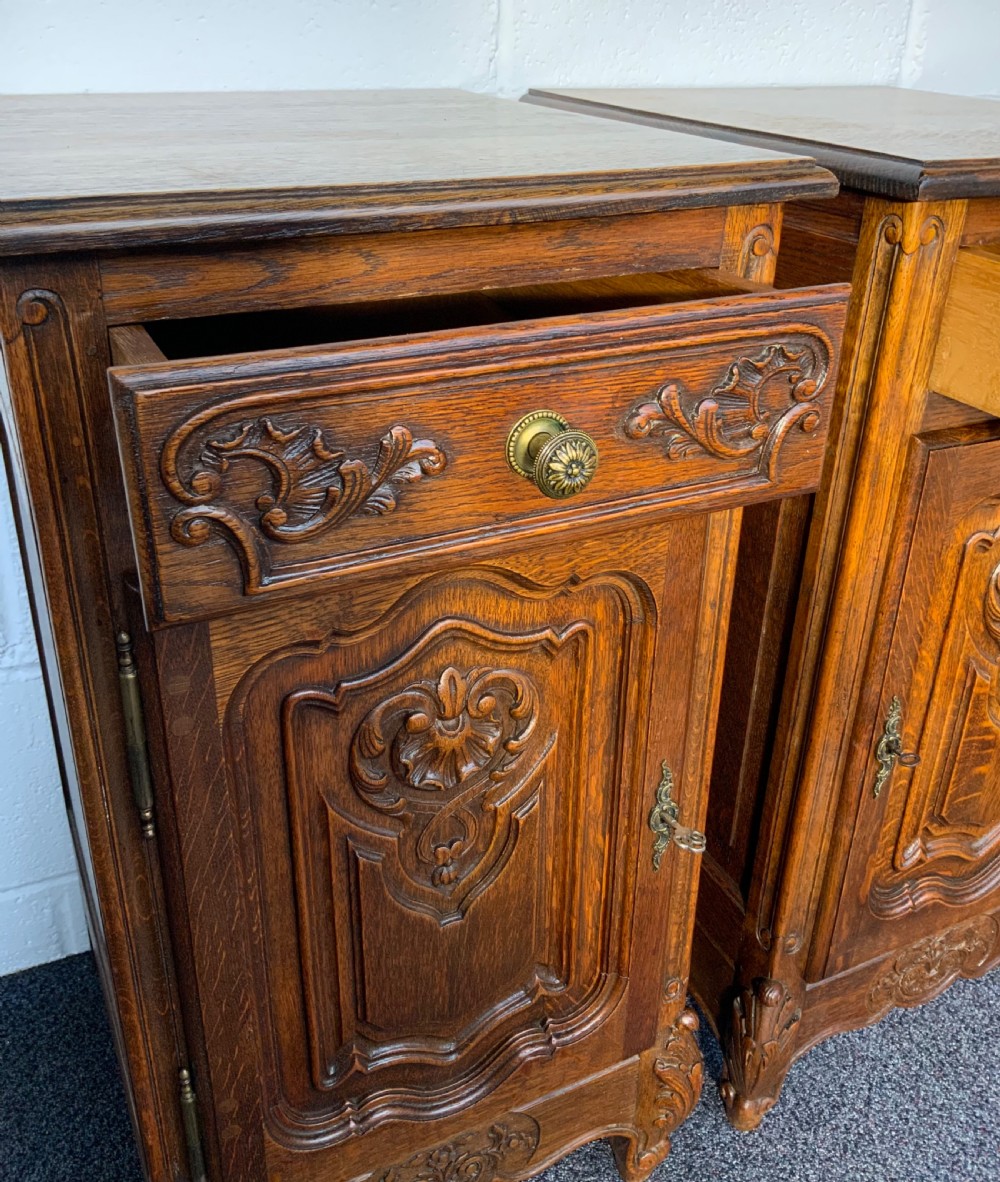 PAIR OF OAK CARVED BEDSIDE CABINETS  View VIII