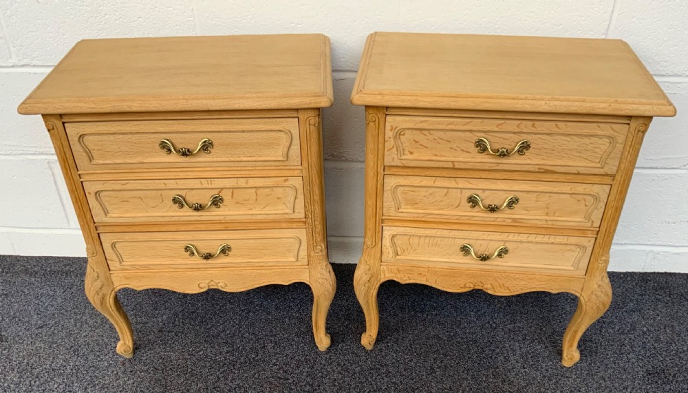 PAIR OF BLEACHED OAK FRENCH BEDSIDE CABINETS 