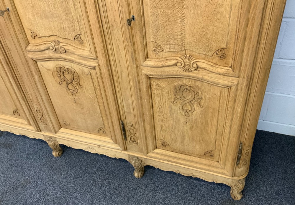 CARVED FRENCH OAK BLEACHED TRIPLE ARMOIRE  View II