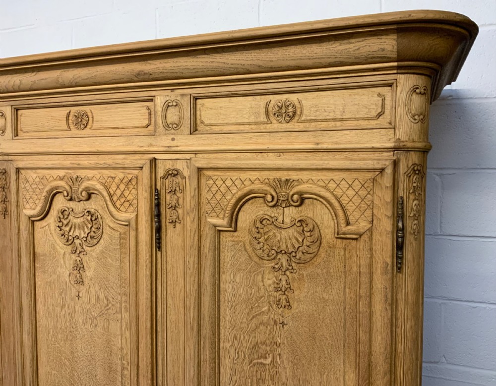 CARVED FRENCH OAK BLEACHED TRIPLE ARMOIRE  View VIII