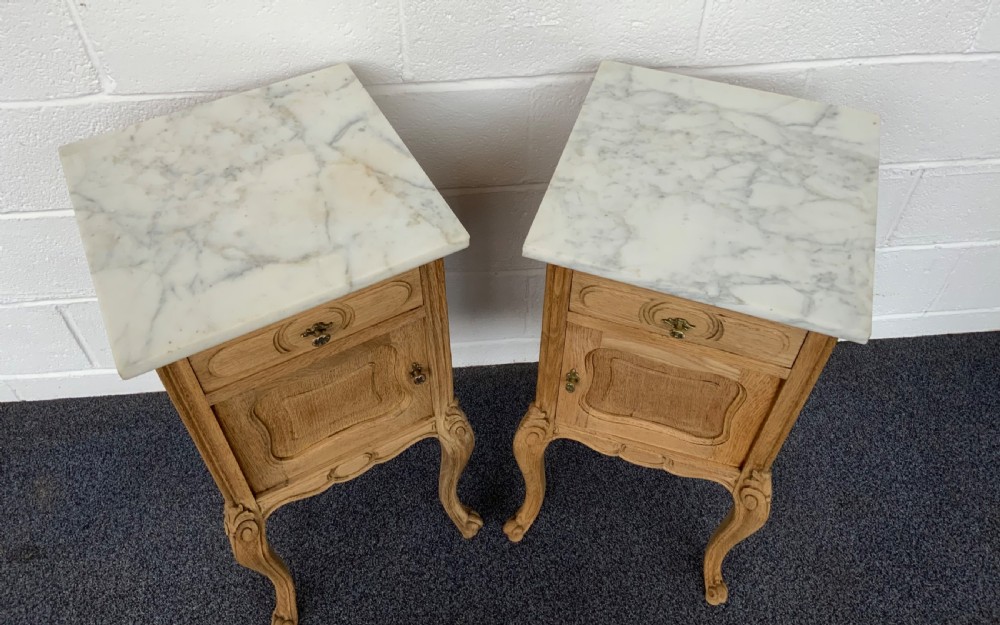 PAIR OF BLEACHED OAK MARBLE TOPPED BEDSIDE CABINETS  View V