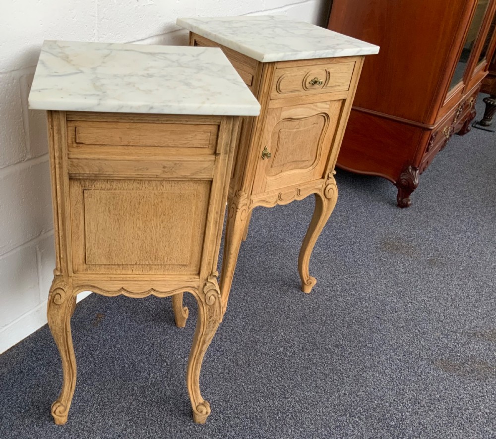 PAIR OF BLEACHED OAK MARBLE TOPPED BEDSIDE CABINETS  View VI