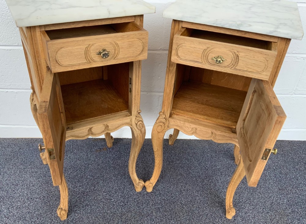 PAIR OF BLEACHED OAK MARBLE TOPPED BEDSIDE CABINETS  View VII