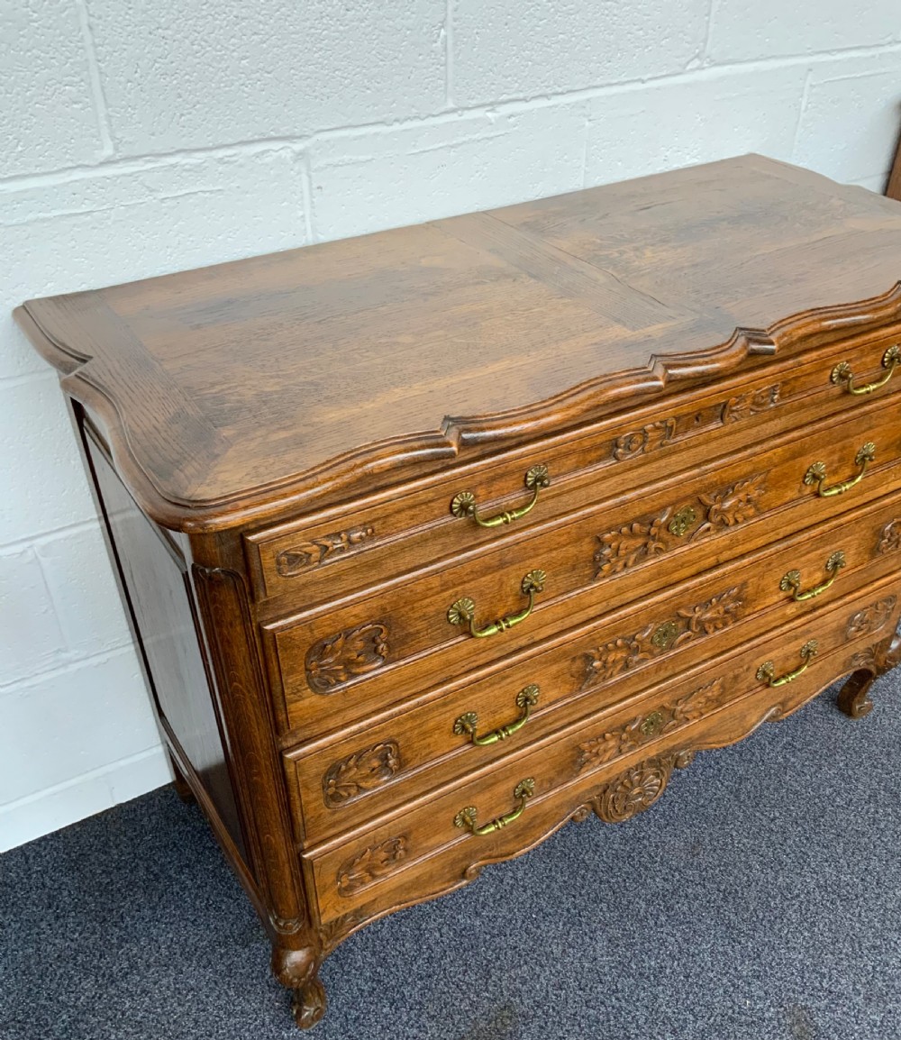 ORNATELY CARVED FRENCH OAK CHEST OF DRAWERS  View III