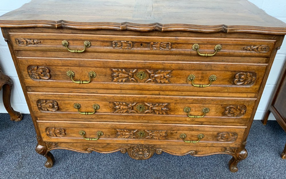 ORNATELY CARVED FRENCH OAK CHEST OF DRAWERS  View VI