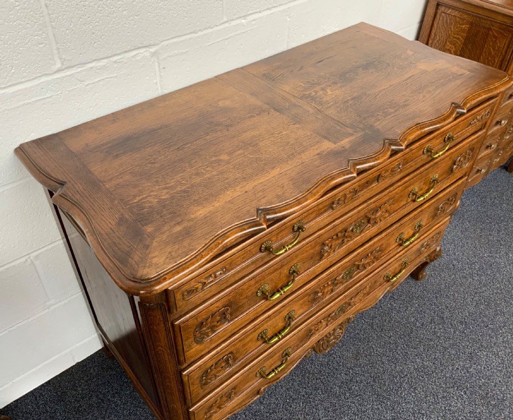 ORNATELY CARVED FRENCH OAK CHEST OF DRAWERS  View IX