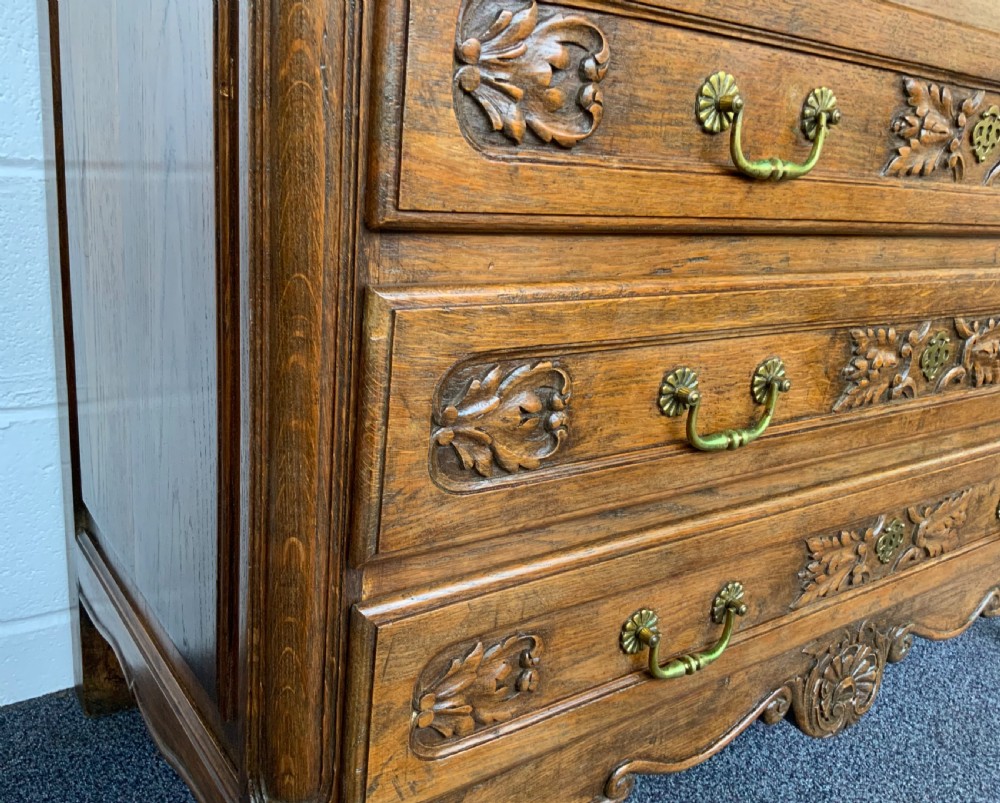 ORNATELY CARVED FRENCH OAK CHEST OF DRAWERS  View XI