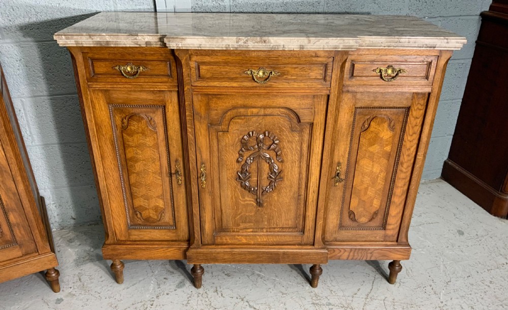 PAIR OF FRENCH MARBLE TOPPED SIDEBOARDS View II