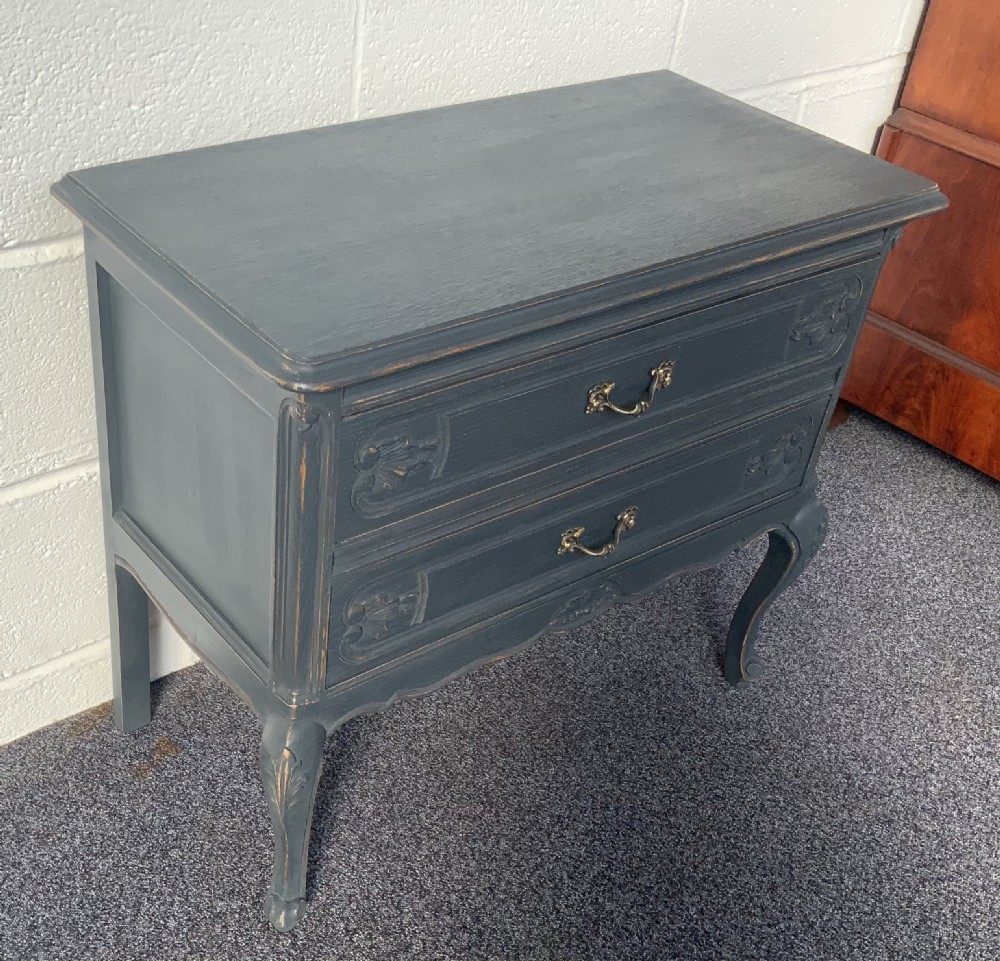 A dark grey painted French provincial style oak commode featuring two carved drawers with brass handles and cabriole legs. View III