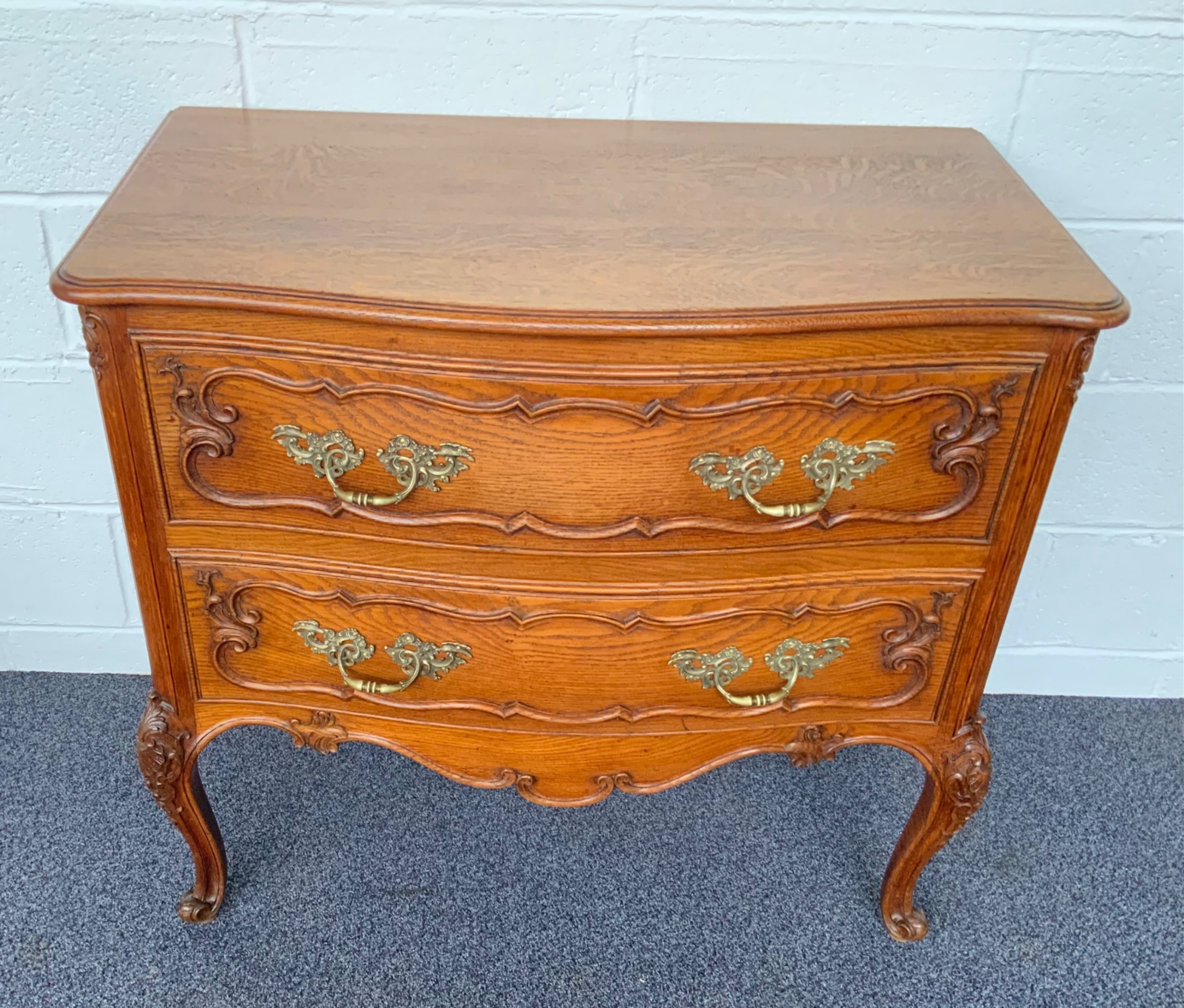 carved oak french bow front chest of drawers - CATEGORY: ANTIQUE CHEST OF DRAWERS - DATED 1910
