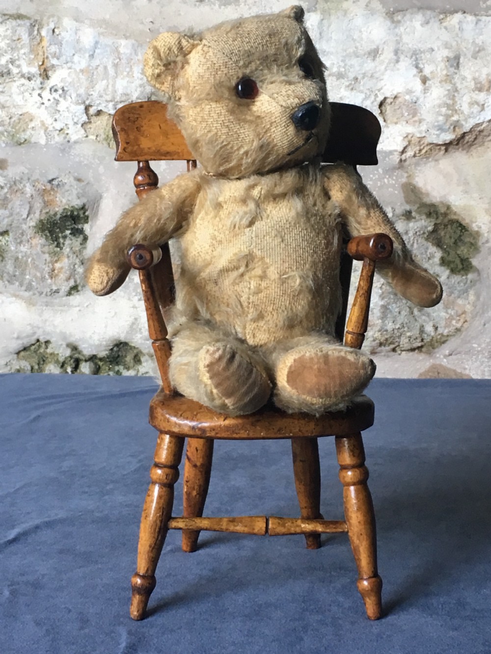 A wooden miniature Windsor armchair featuring turned spindle back supports, curved armrests, and turned legs. View XIII