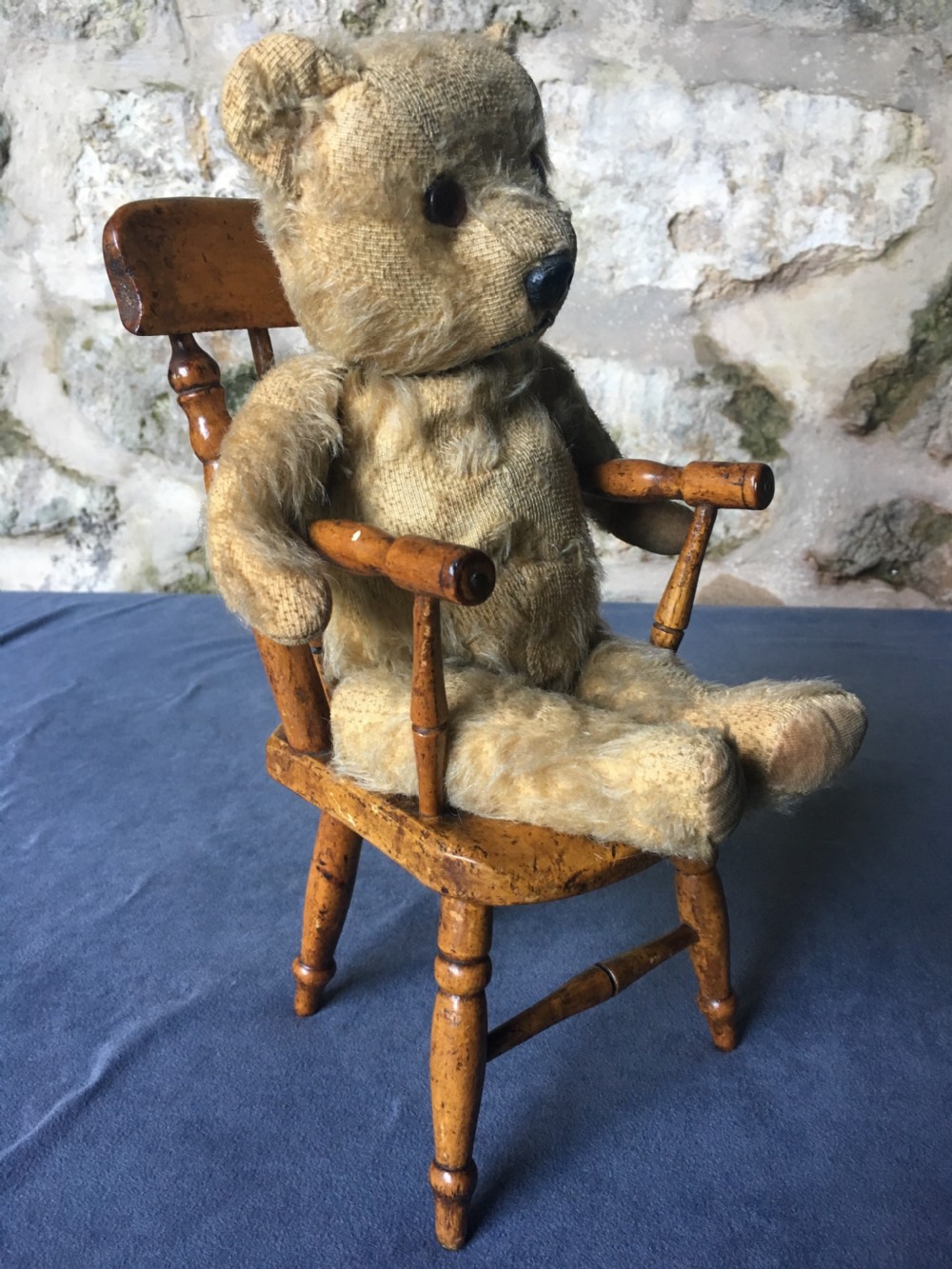 A wooden miniature Windsor armchair featuring turned spindle back supports, curved armrests, and turned legs. View XIV
