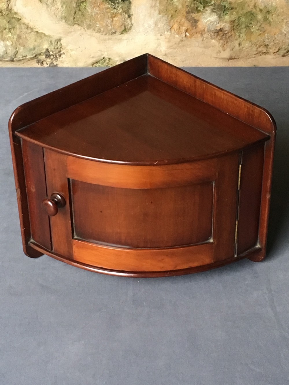 Small bow fronted corner cupboard 