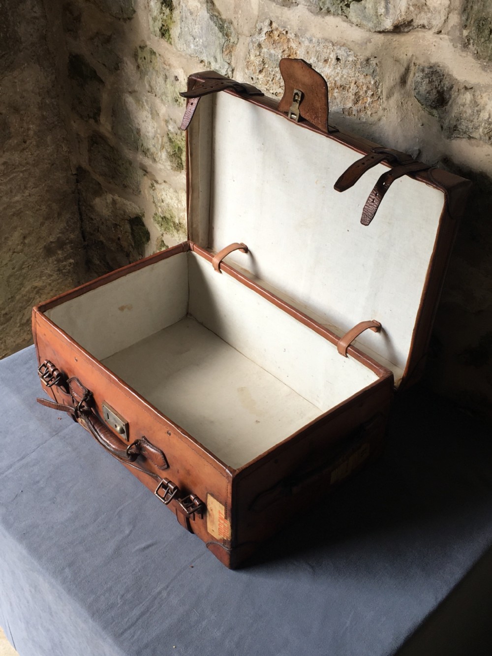 Luggage: a wonderful leather suitcase  View XII