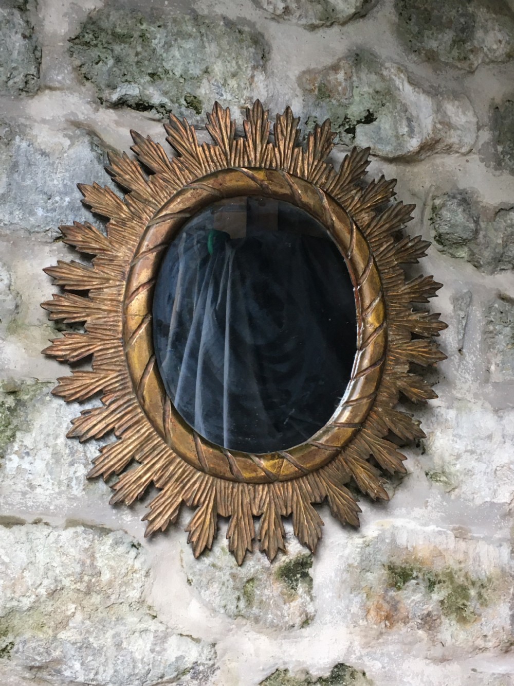 Giltwood oval wall mirror