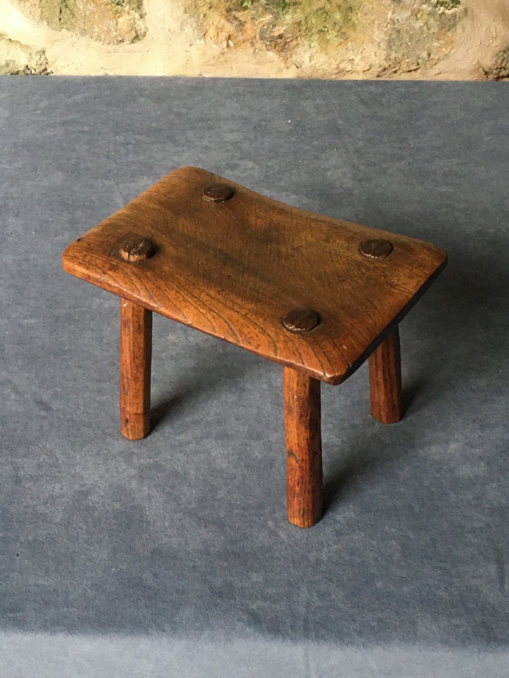 Small c19th elm stool View III