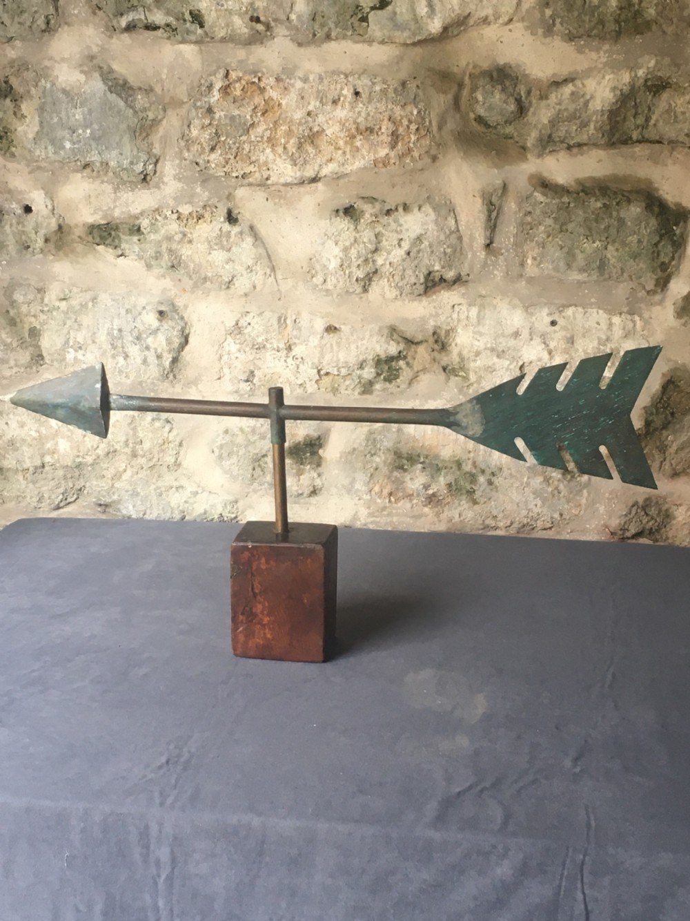 Metalwork: a superb arrow weather vane