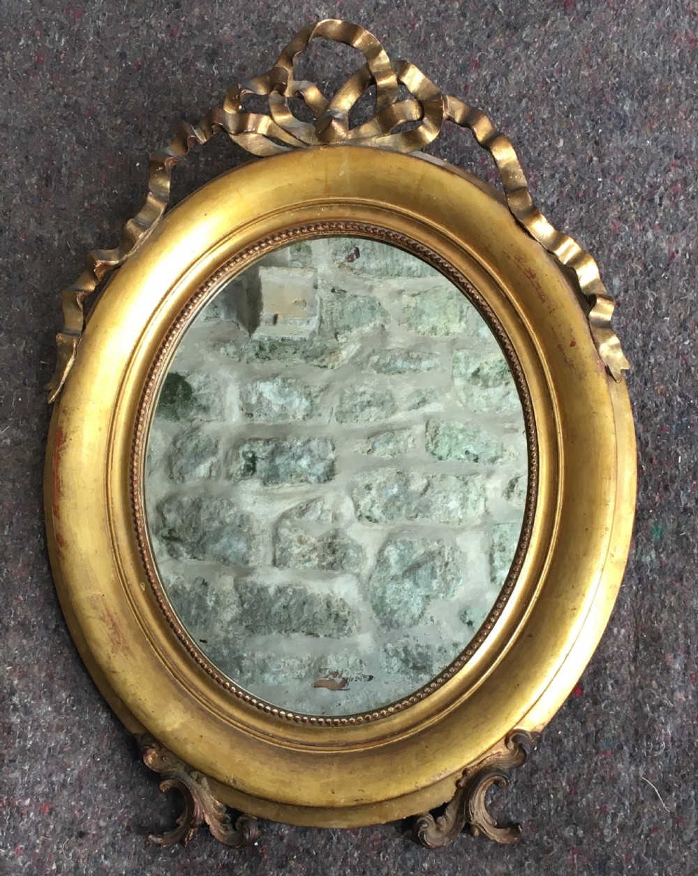 c19th oval gilt framed mirror
