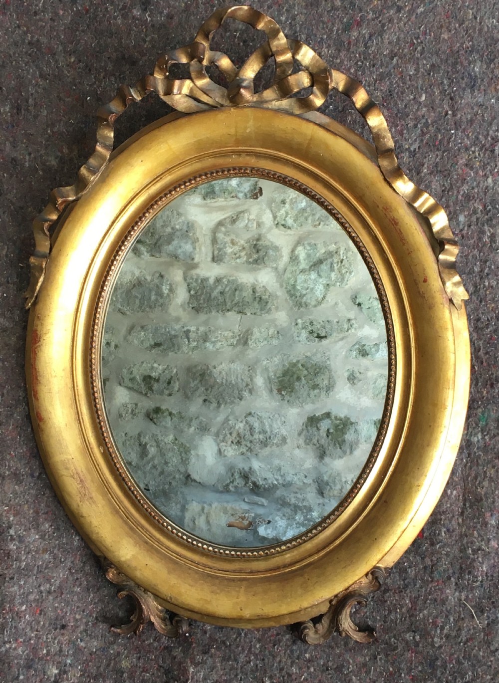 c19th oval gilt framed mirror View II