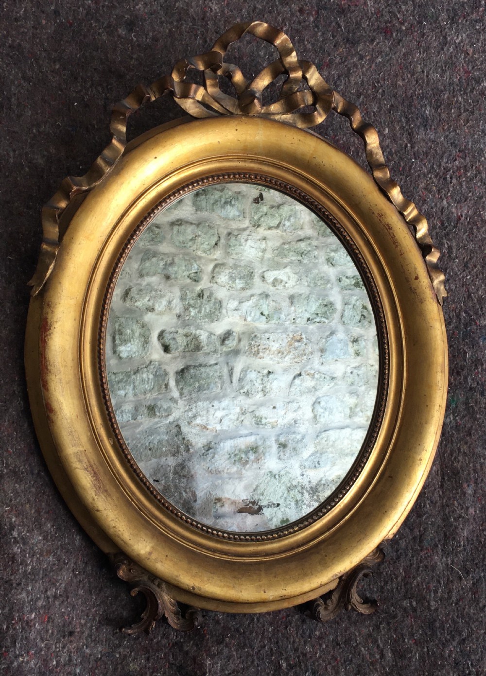 c19th oval gilt framed mirror View X