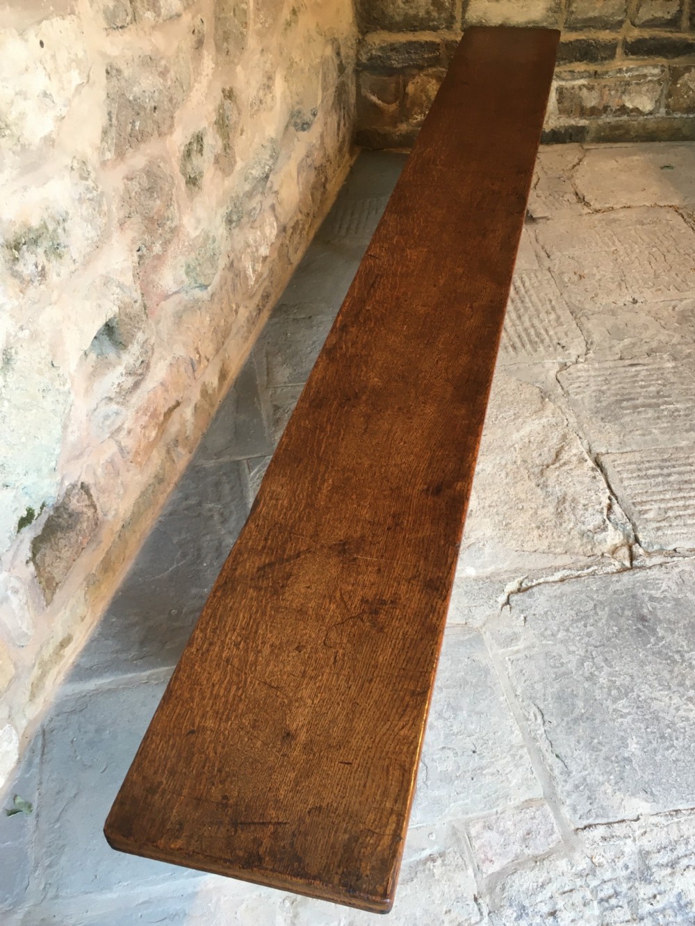  A long oak bench View III