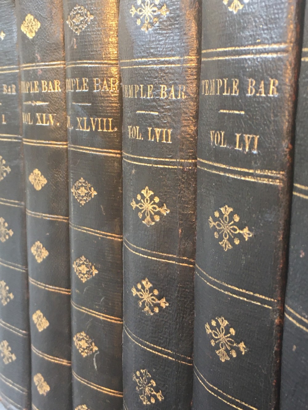 A collection of 12 leather-bound books
