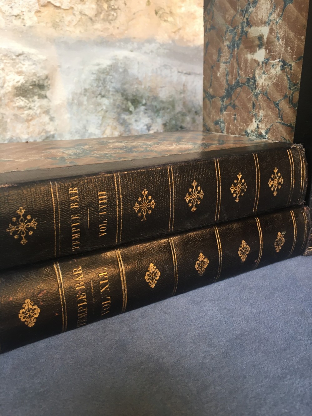 A collection of 12 leather-bound books View VI
